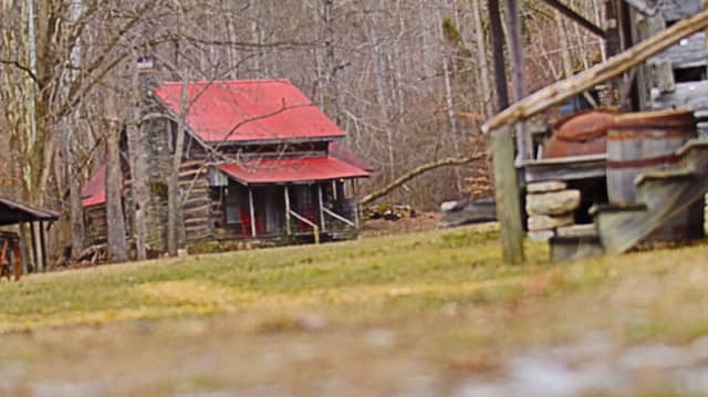 Red-Roofed Log Cabin - Image 1
