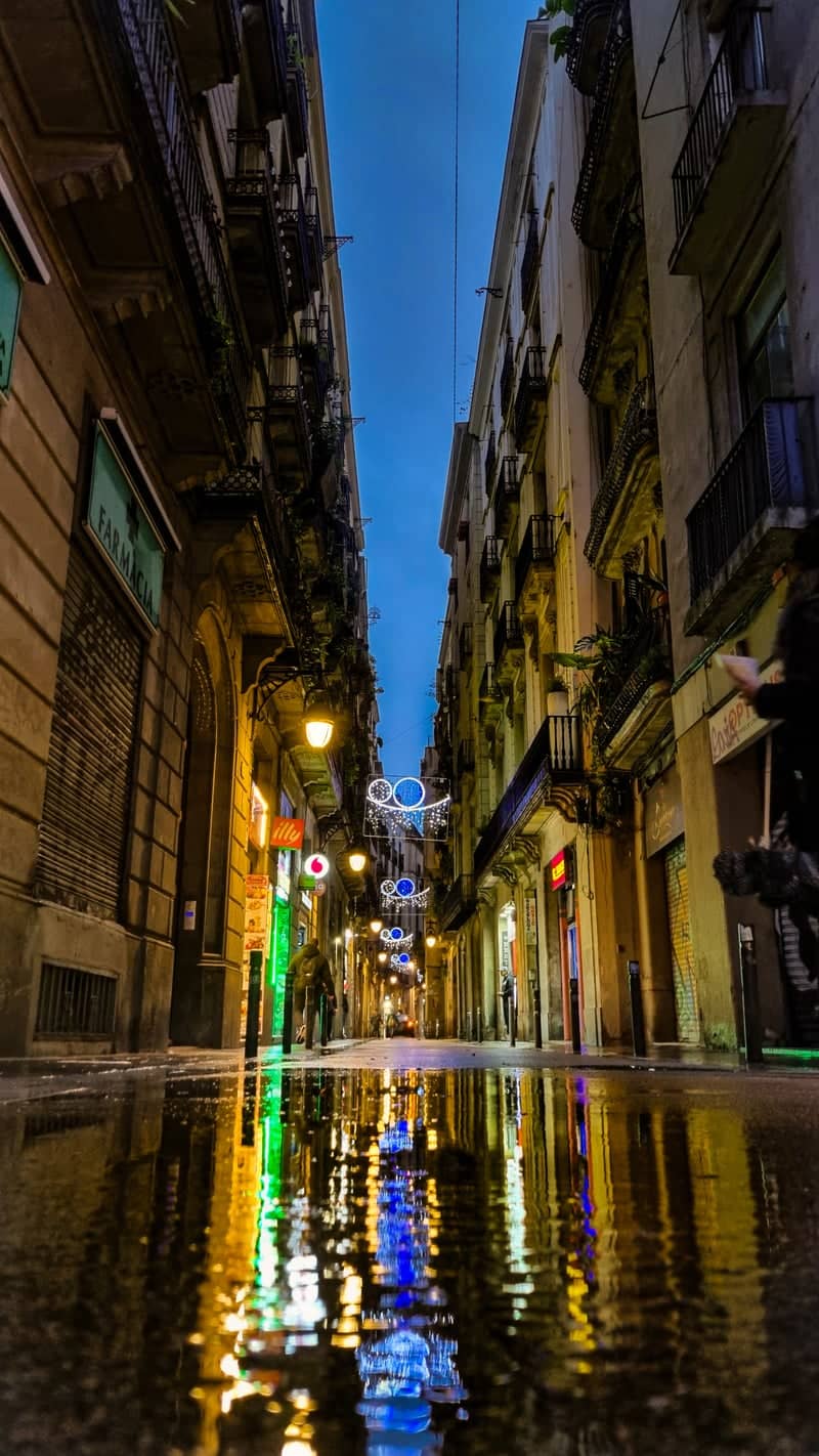 Barcelona Alleyway Reflection - Image 1