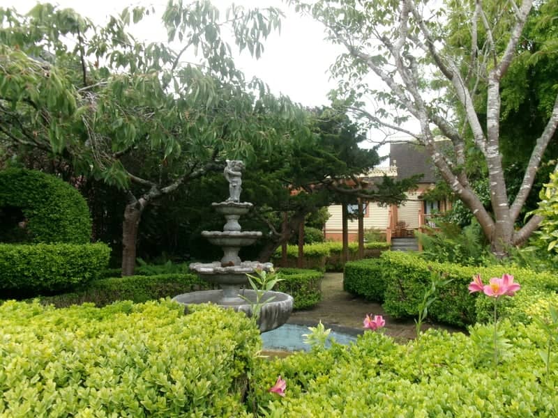 Gingerbread Mansion Inn Garden - Image 1