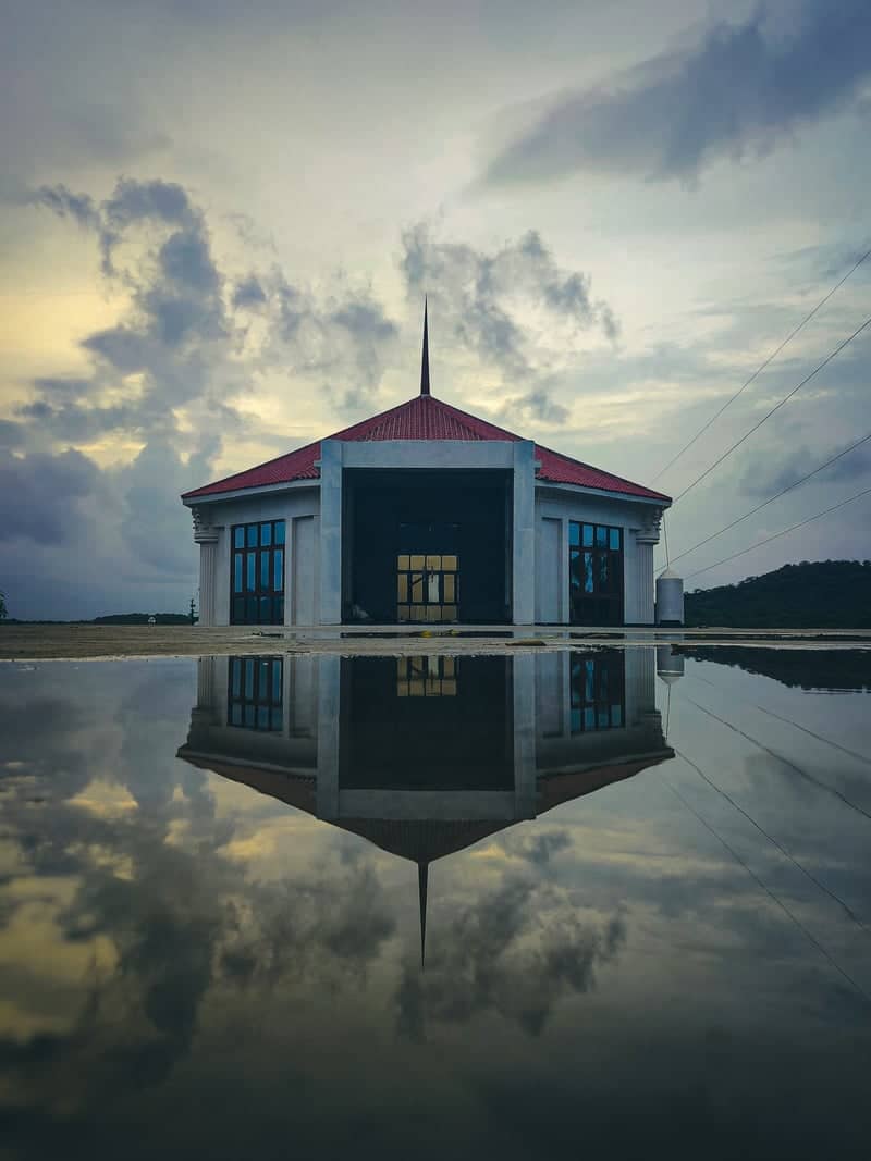 Symmetrical Pavilion Reflection - Image 1