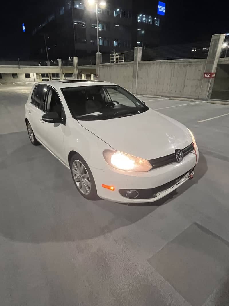 Sandy Rooftop Parking Garage - Image 1