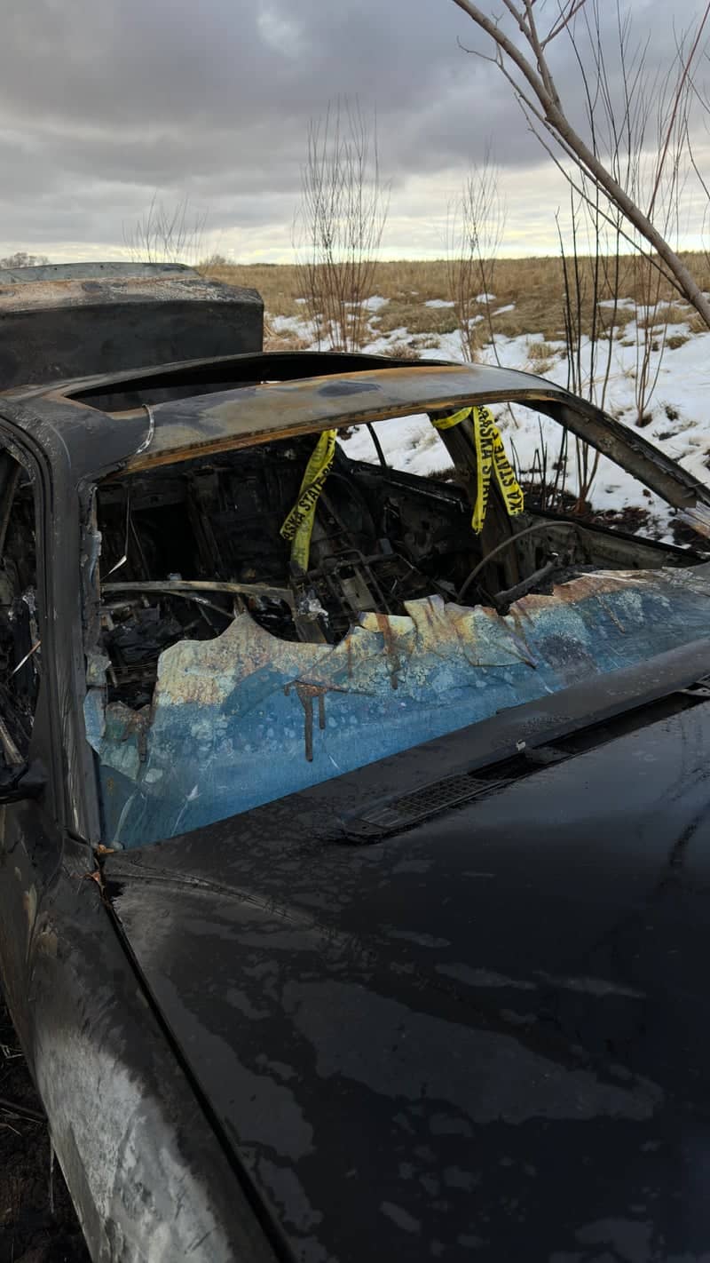 Burnt Car Wreckage in Madison Field - Image 1